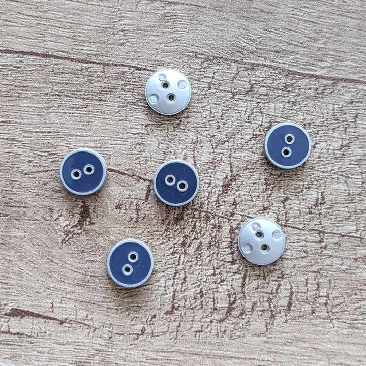 Bouton bleu gris contour argent 10 mm