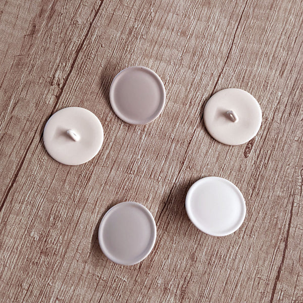 Bouton à queue lisse beige 23 mm