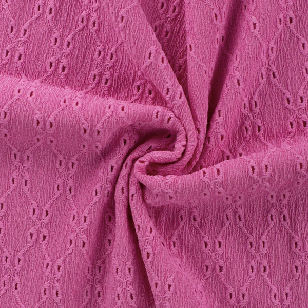 Tissu brodé froissé fuschia