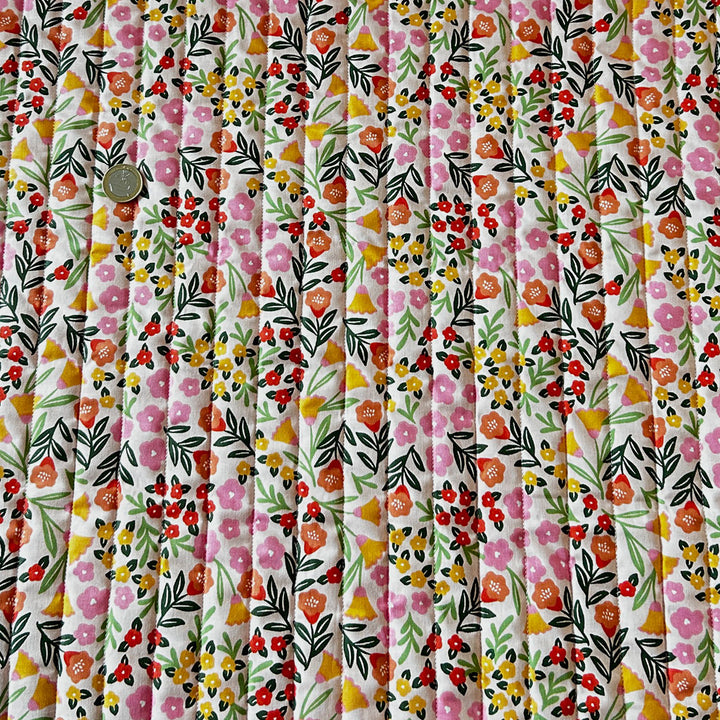 Matelassé coton double face fleur rose orange et carreau