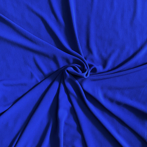Tissu crêpe polyester bleu intense