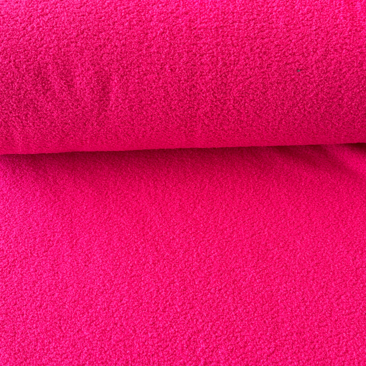 Fausse fourrure double face bouclette/polaire rose fluo