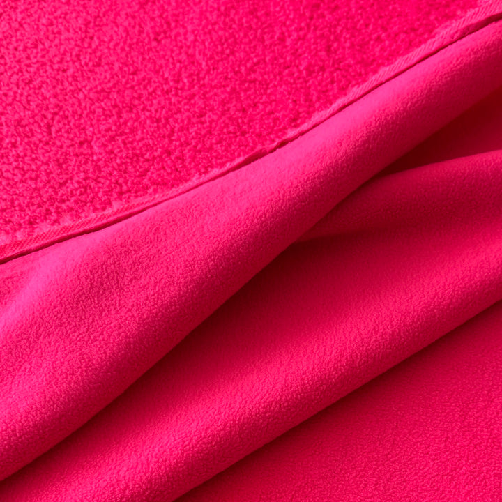 Fausse fourrure double face bouclette/polaire rose fluo