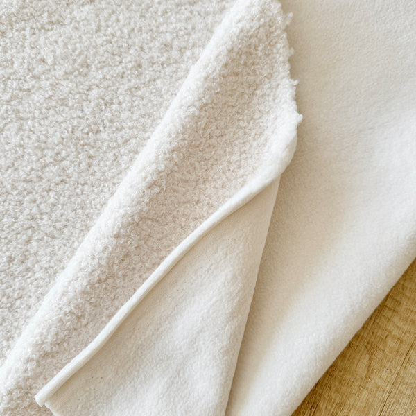 Fausse fourrure double face bouclette/polaire écrue