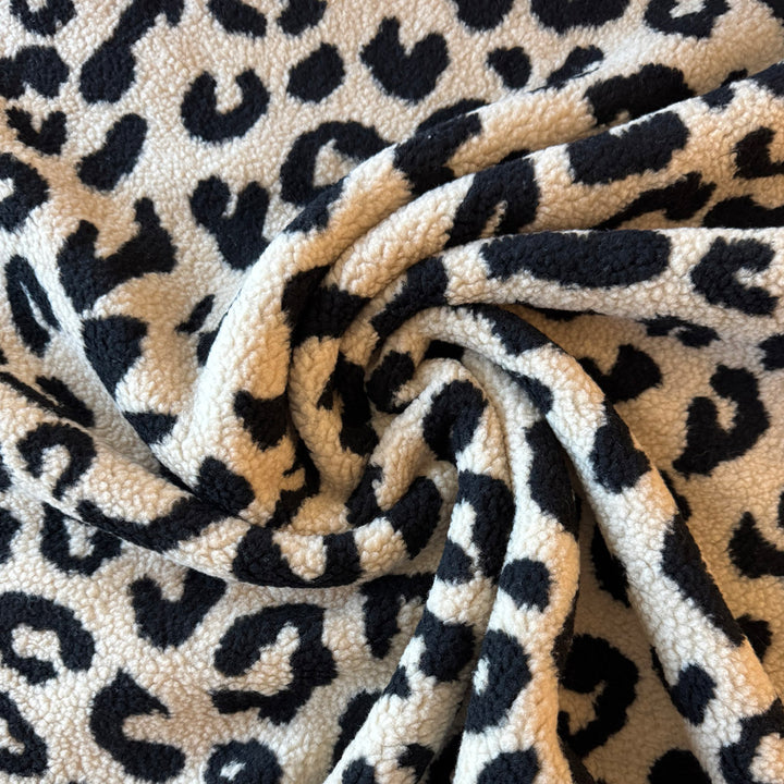 Fausse fourrure mouton écru léopard XL noir