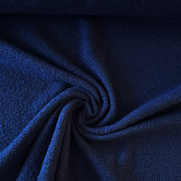 Fausse fourrure double face bouclette/polaire marine