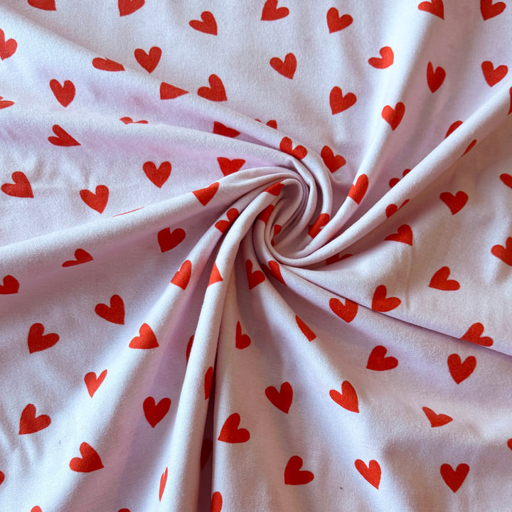 Tissu flanelle de coton rose coeur rouge