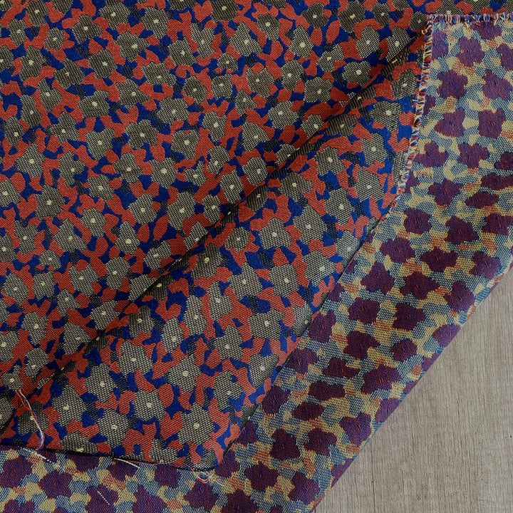 Jacquard soyeux fleur rouille, bleu et or
