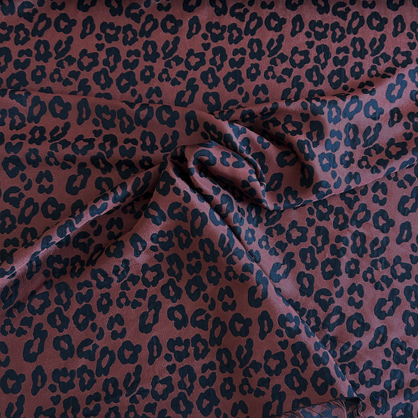 Jacquard brique léopard noir