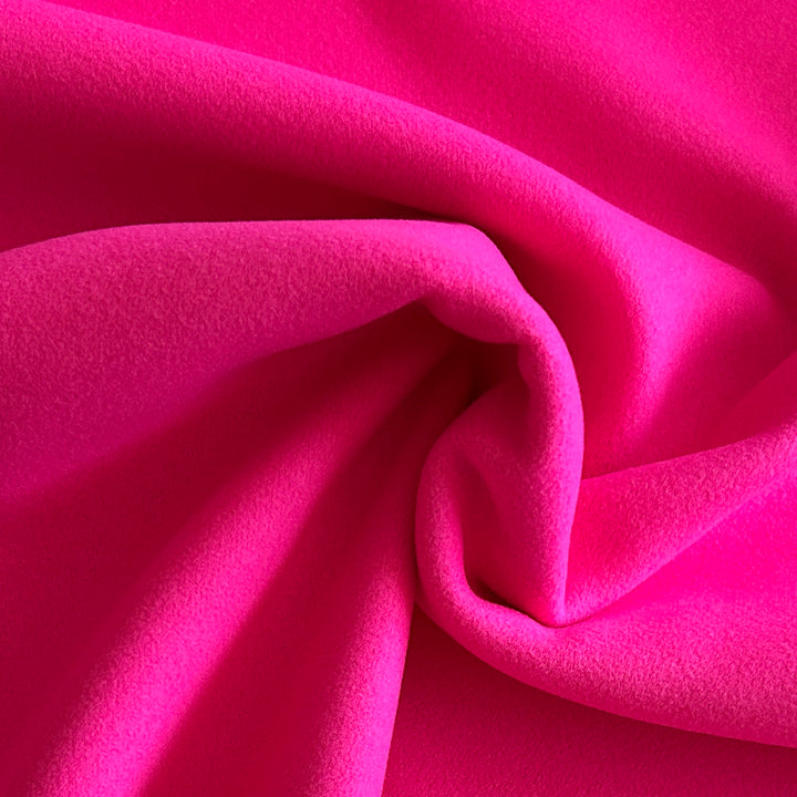 Tissu lainage synthétique rose vif