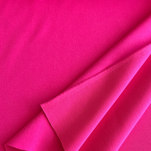 Tissu lainage synthétique rose vif