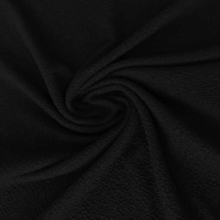 Maille épaisse léopard ton sur ton noir