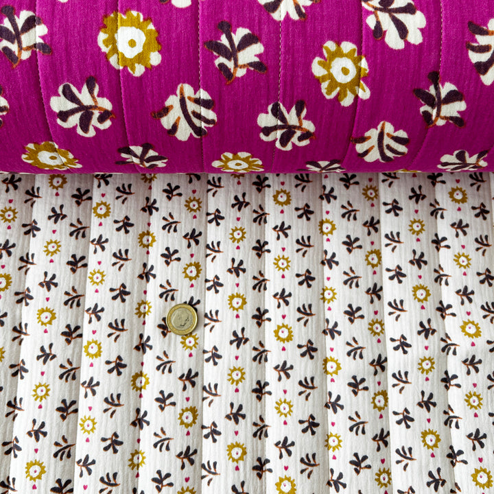 Matelassé coton double gaze fuschia et blanc fleurs