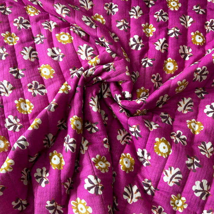 Matelassé coton double gaze fuschia et blanc fleurs