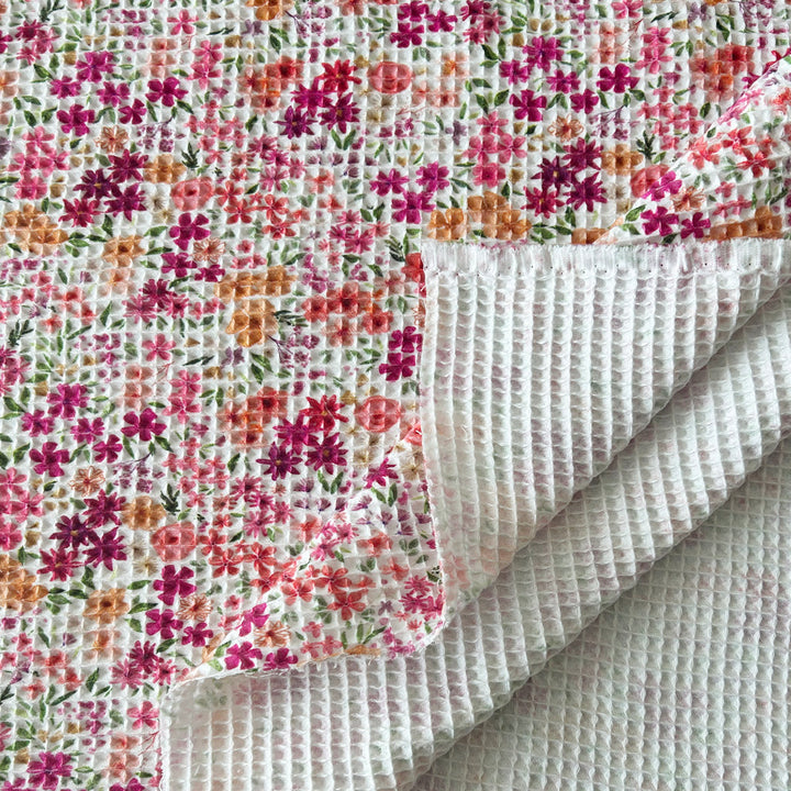 Tissu nid d'abeille blanc imprimé fleur rouge
