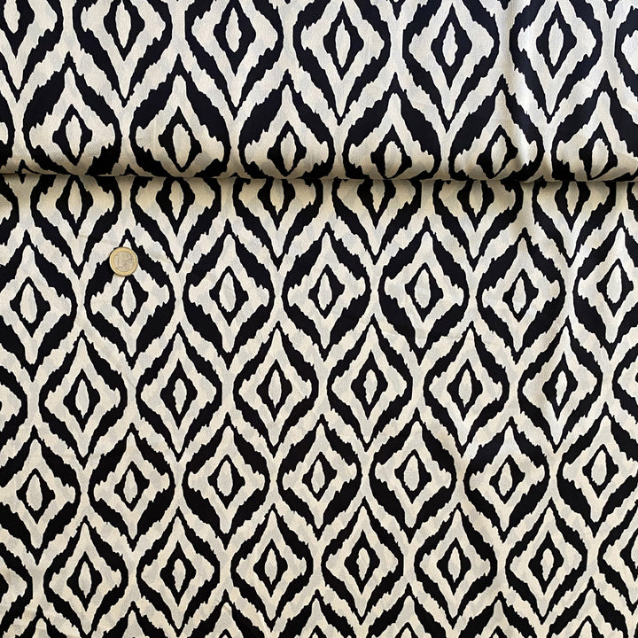Tissu satiné noir et écru graphique