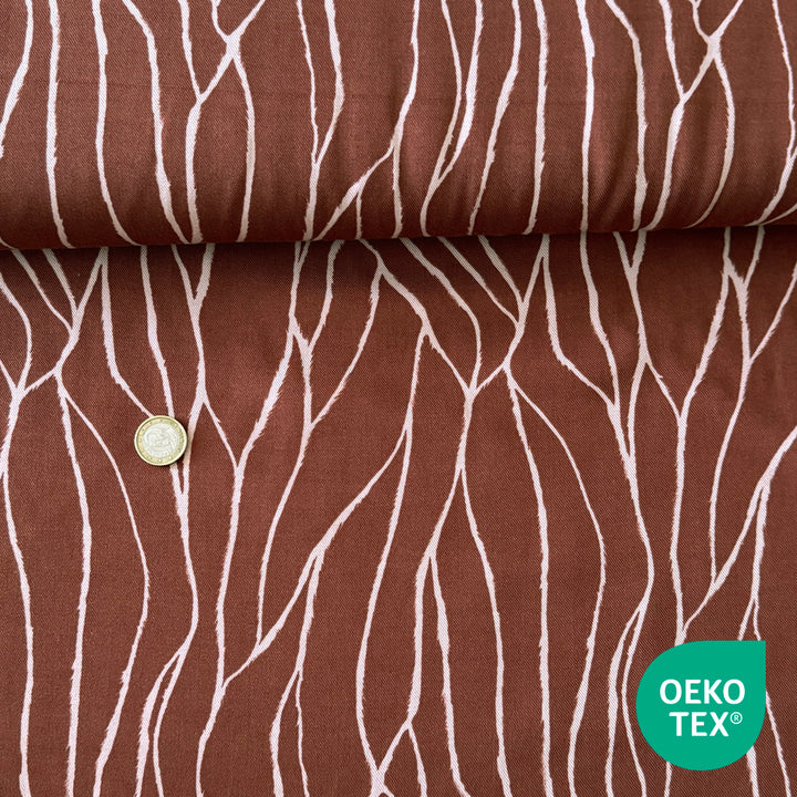 Sergé viscose brique imprimé abstrait