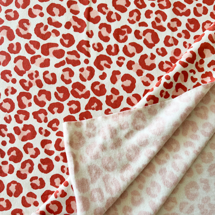 Sweat écru léopard rouge corail