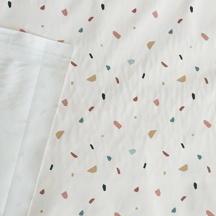 Tissu imperméable écru miettes
