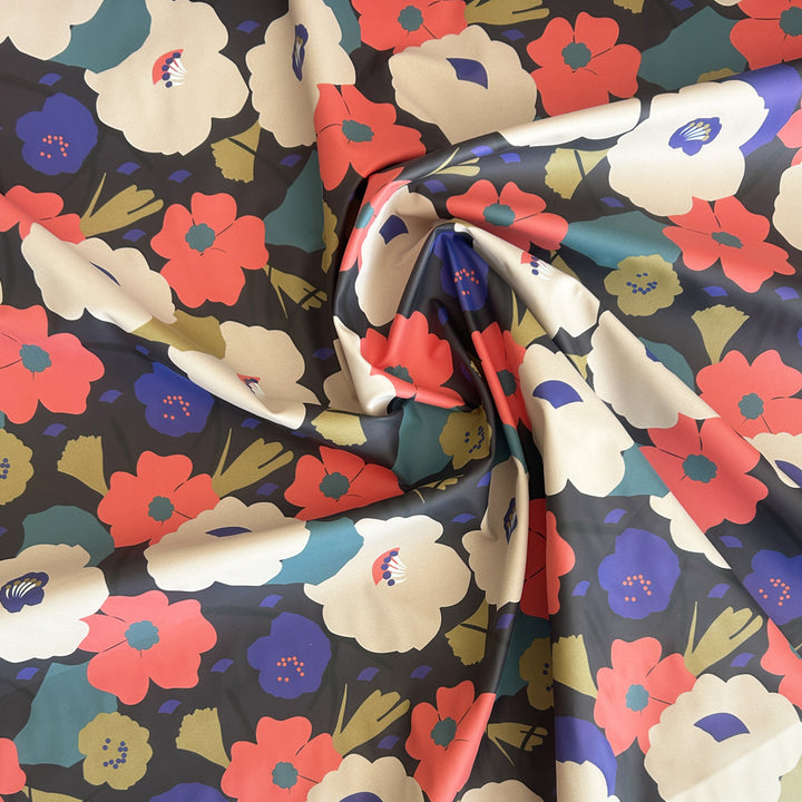 Tissu imperméable cirée noir multi fleurs