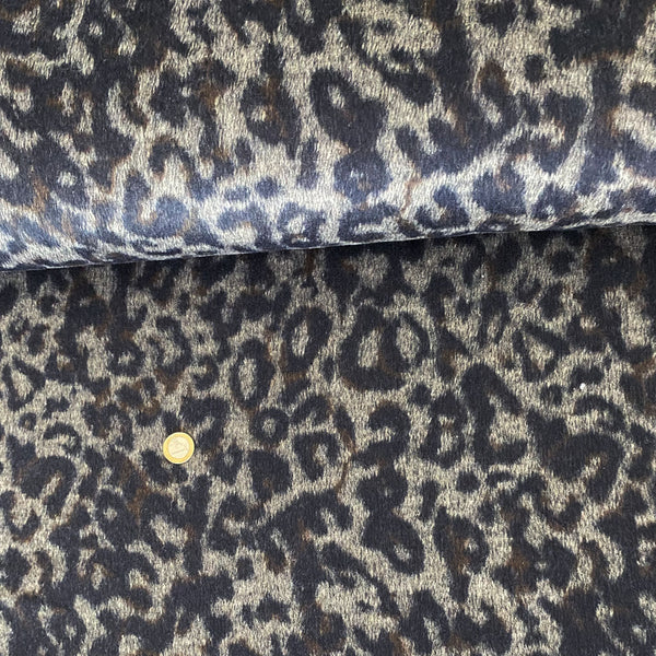 Fausse fourrure poil ras léopard beige et noir