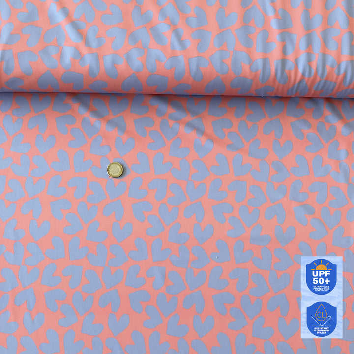Tissu maillot de bain corail coeur lilas