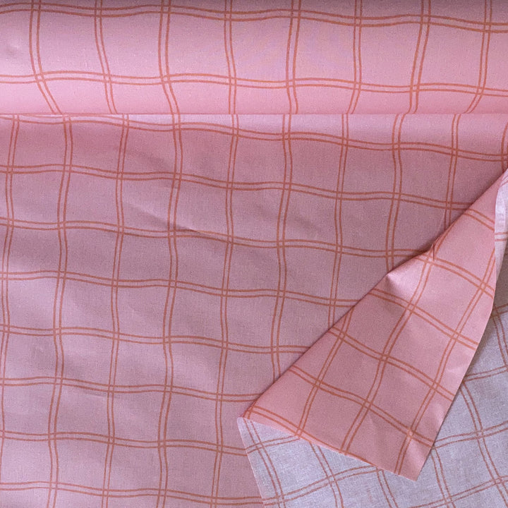 Tissu enduit rose carreaux