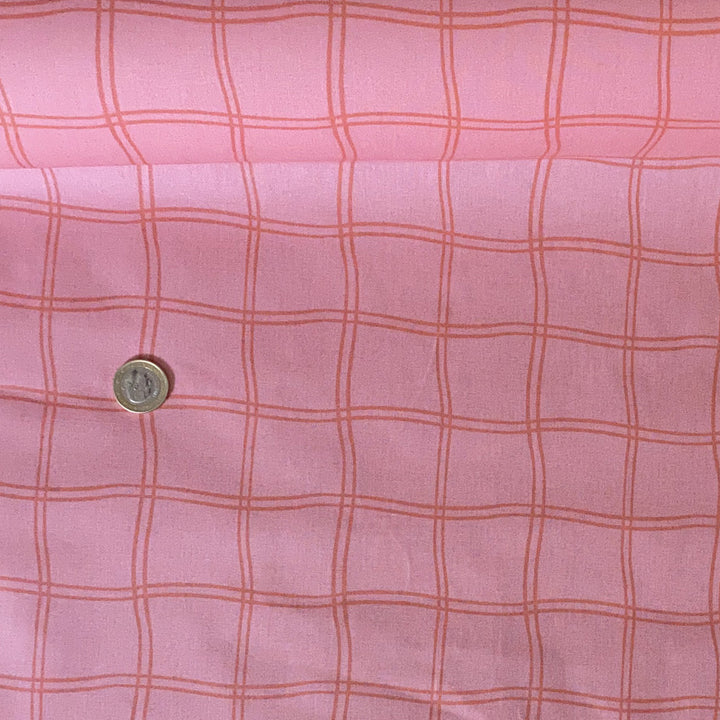 Tissu enduit rose carreaux