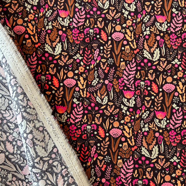 Velours milleraie noir fleurs rose orange