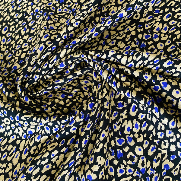 Sergé viscose léopard noir ambre et bleu