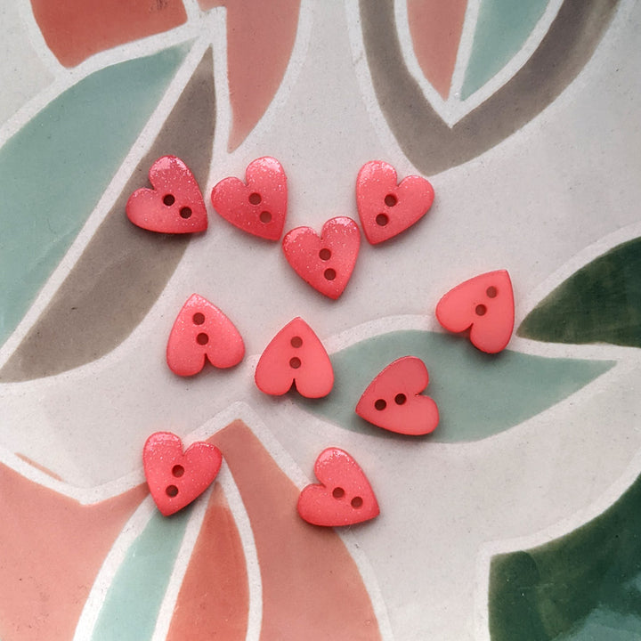 Bouton irisé coeur grenadine 12 mm
