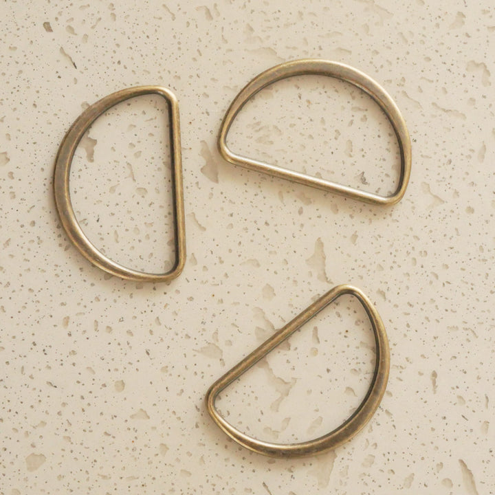 Boucle demi-lune métal bronze 25 mm – Super Bison Boucle demi-lune métal bronze 25 mm – Super Bison