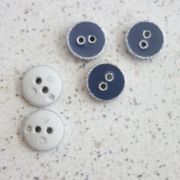 Boutons bleu/gris contour paillettes argent 12 mm