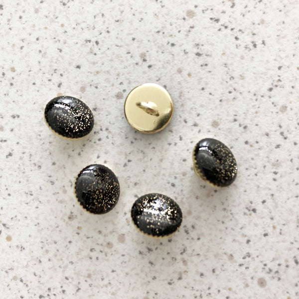 Bouton métal cerclage or, paillette or, noir 11 mm