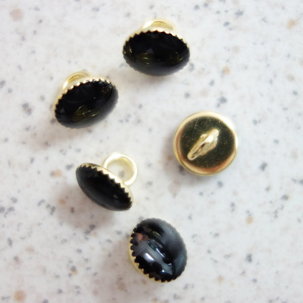 Boutons noir cerclage dentelé or 9 mm