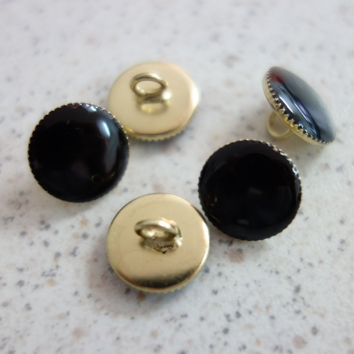 Boutons noir cerclage dentelé or 12 mm