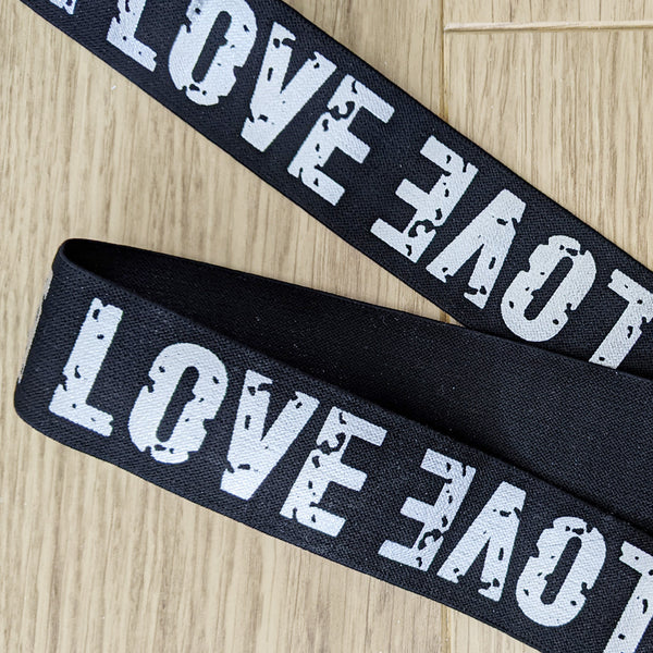 Elastique noir love argent 40 mm