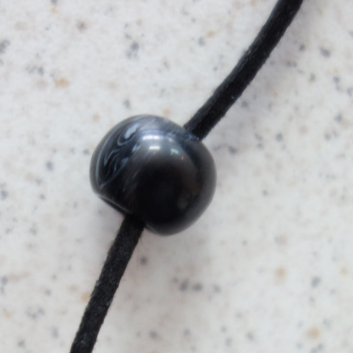 Perle noire pour cordon