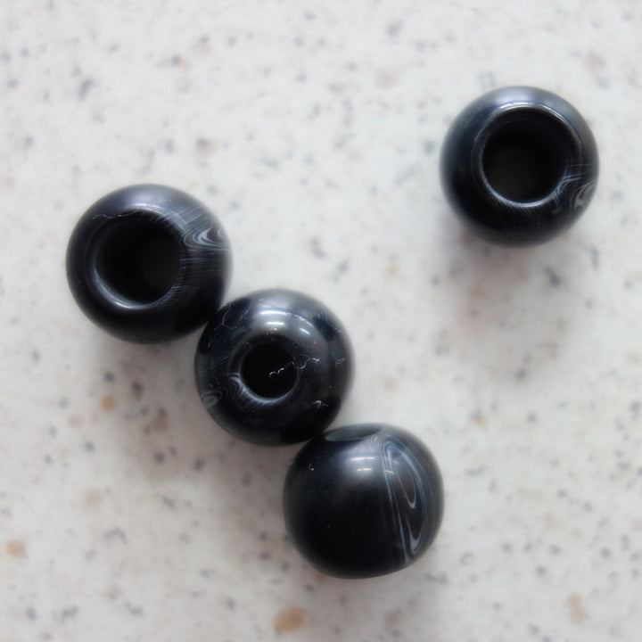 Perle noire pour cordon