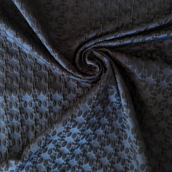 Jacquard gaufré marine et noir motif pastille