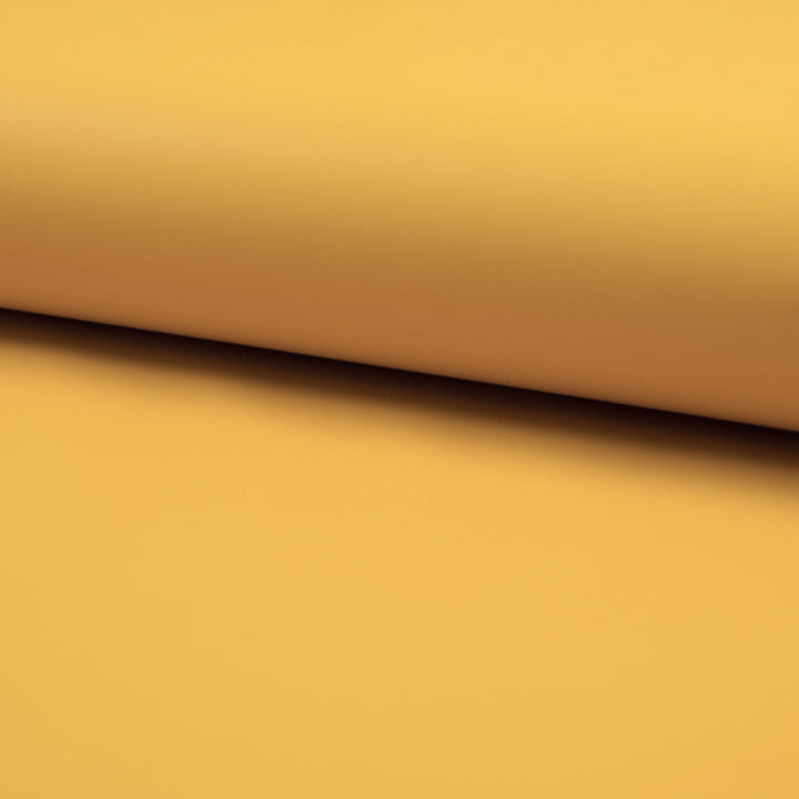 Tissu imperméable cirée jaune