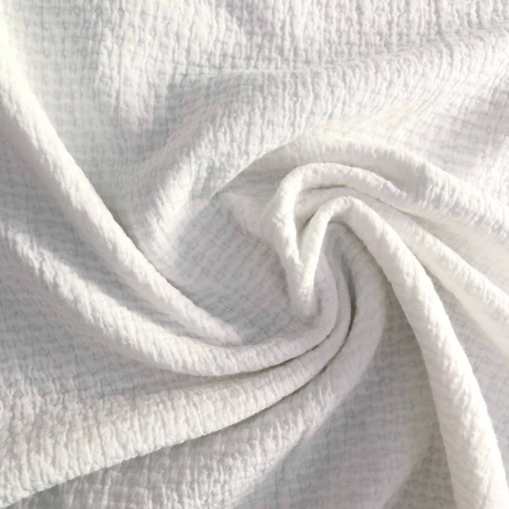 Tissu gaufré surpiqué écru