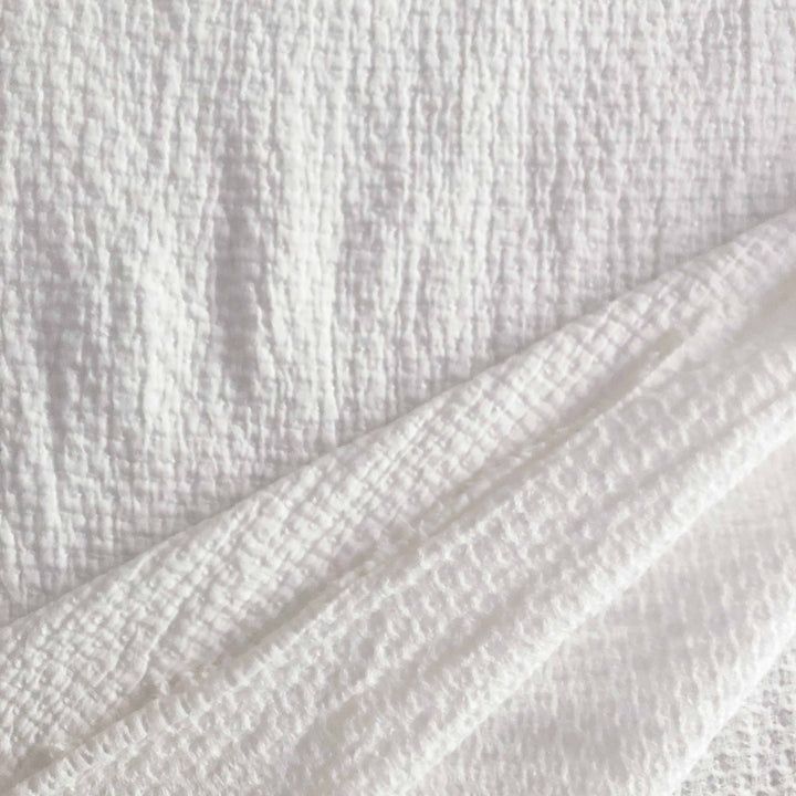 Tissu gaufré surpiqué écru
